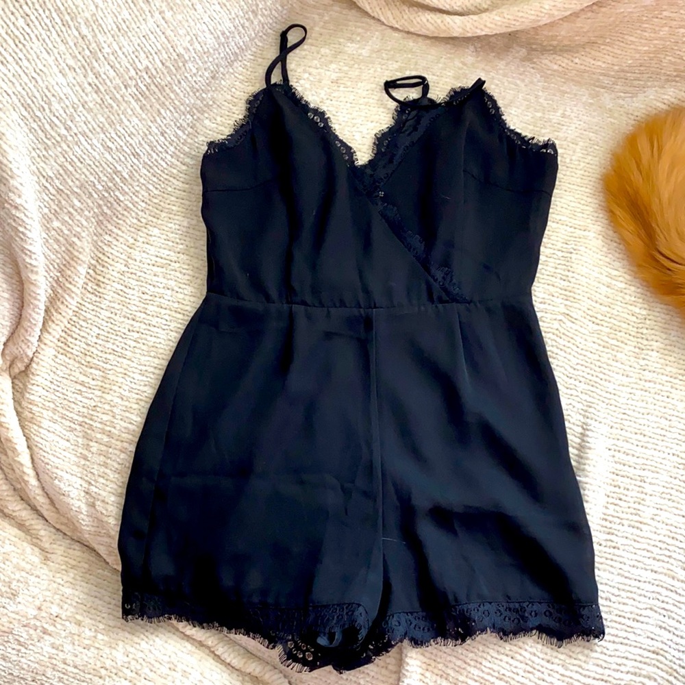 Black BEBE romper size 2
